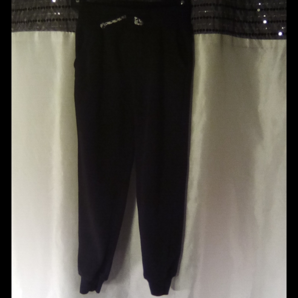 Black sweatpants with black and white drawstring
